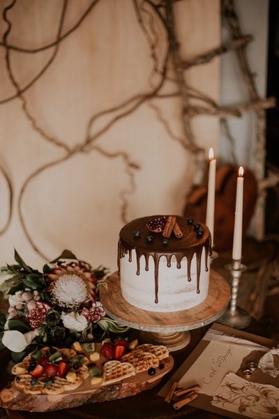 The candles beside the chocolate cake
